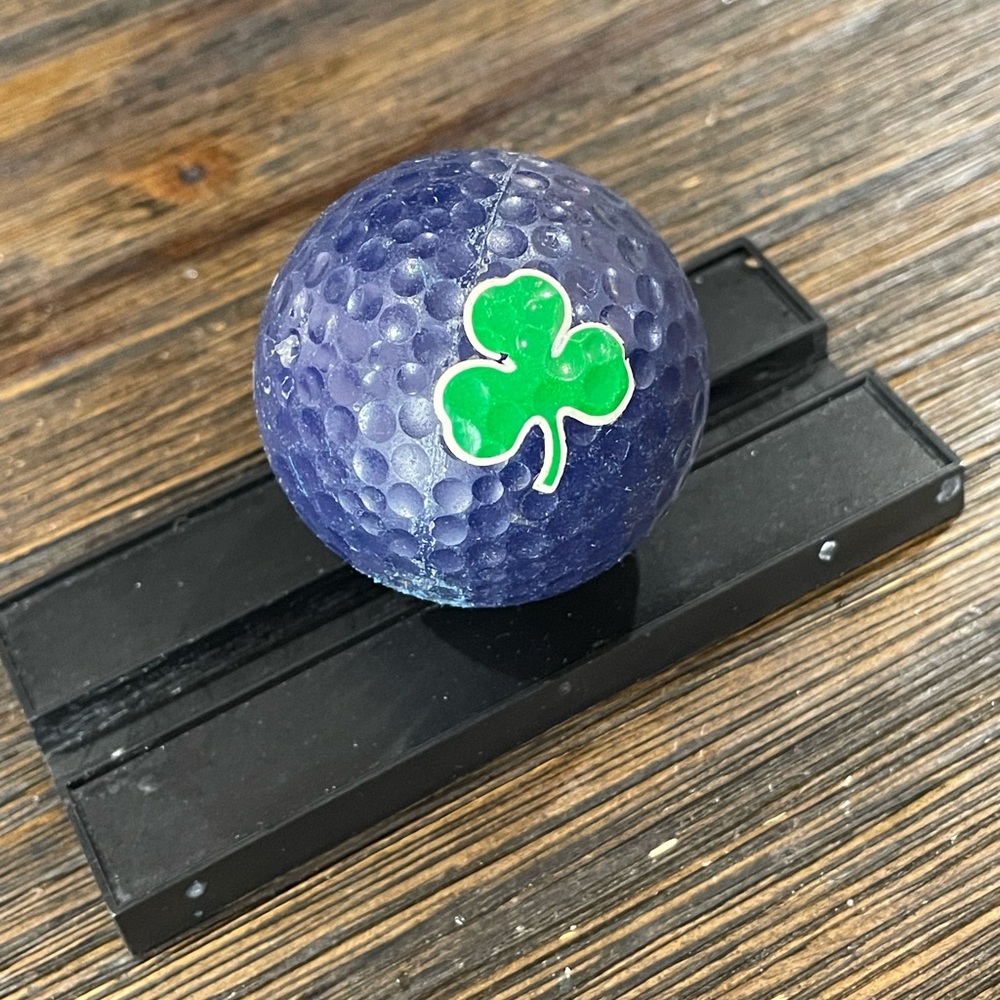 Golfball With Lucky Clover Logo